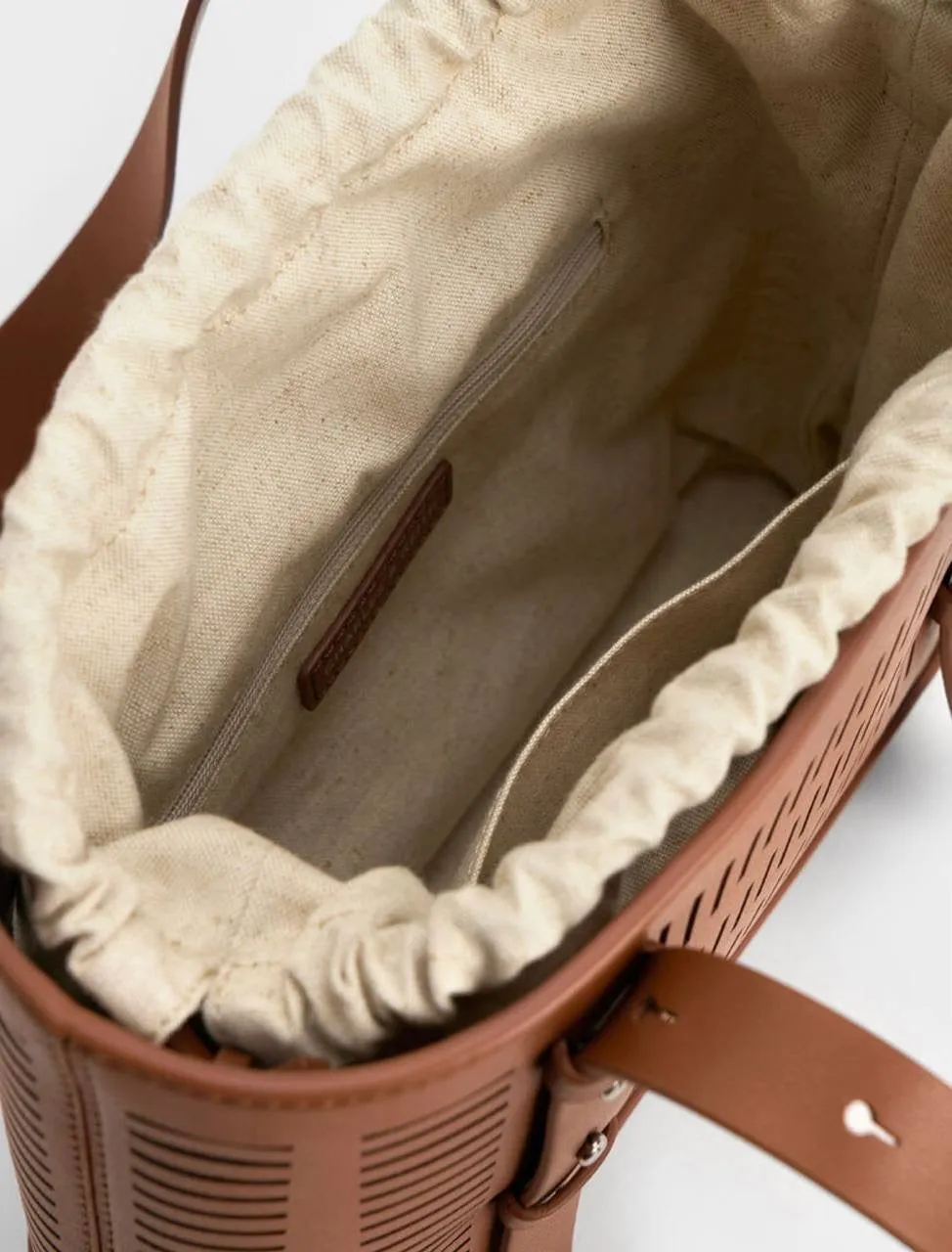 Delphi Cut-Out Bucket Bag